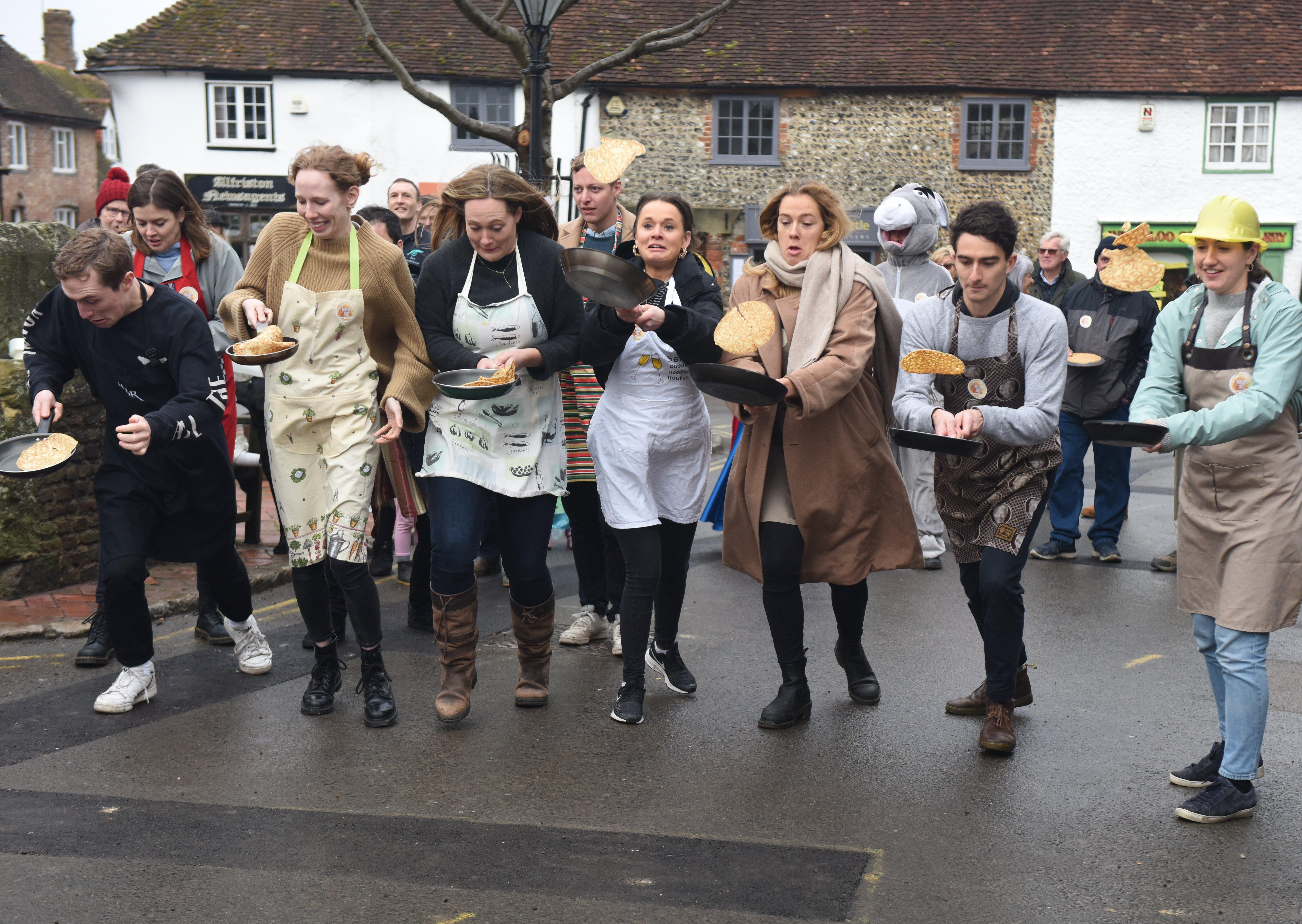 The first Great Alfriston Pancake Race. Photograph: Justin Lycett/ SUS-200223-142149001