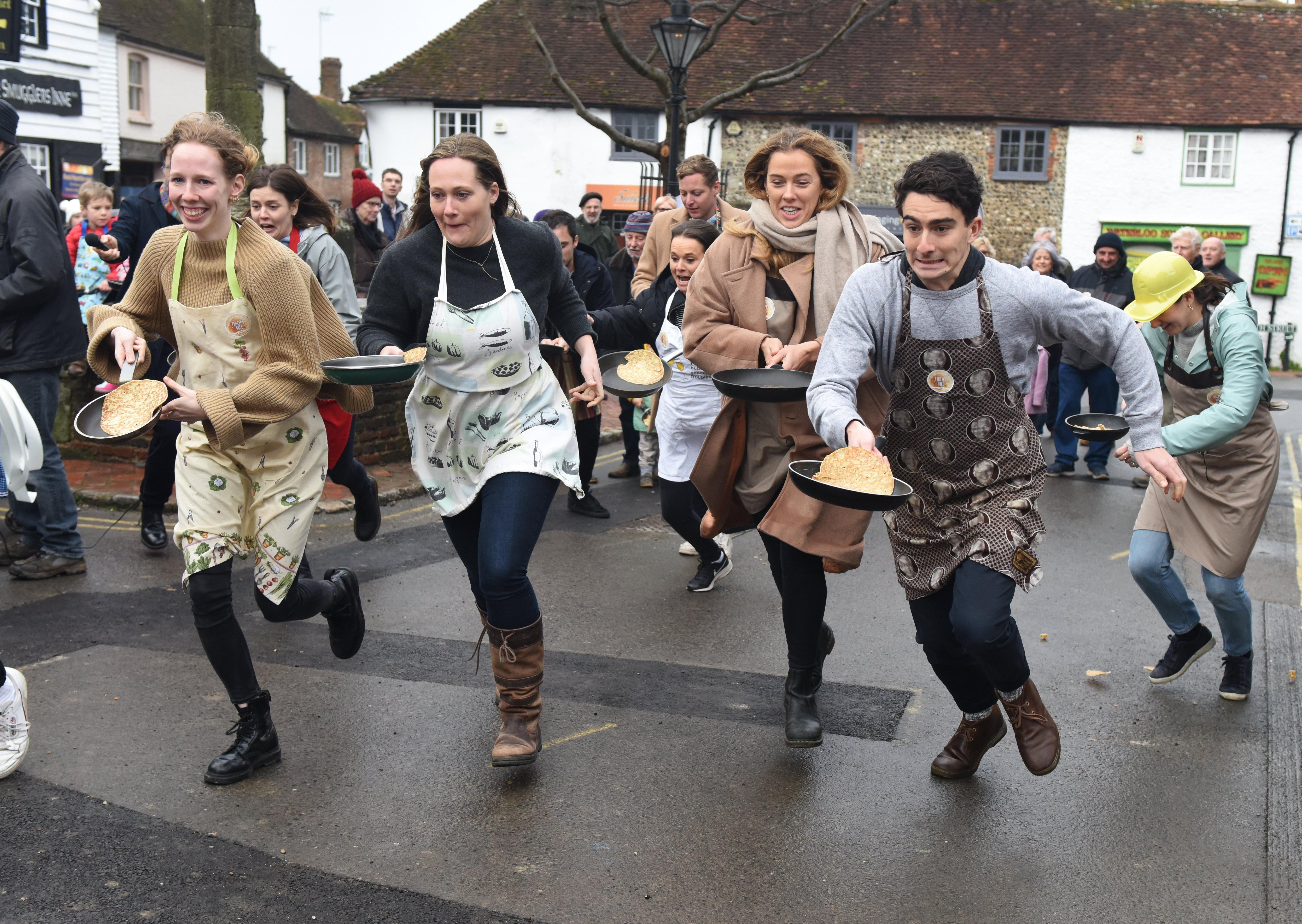 The first Great Alfriston Pancake Race. Photograph: Justin Lycett/ SUS-200223-142203001