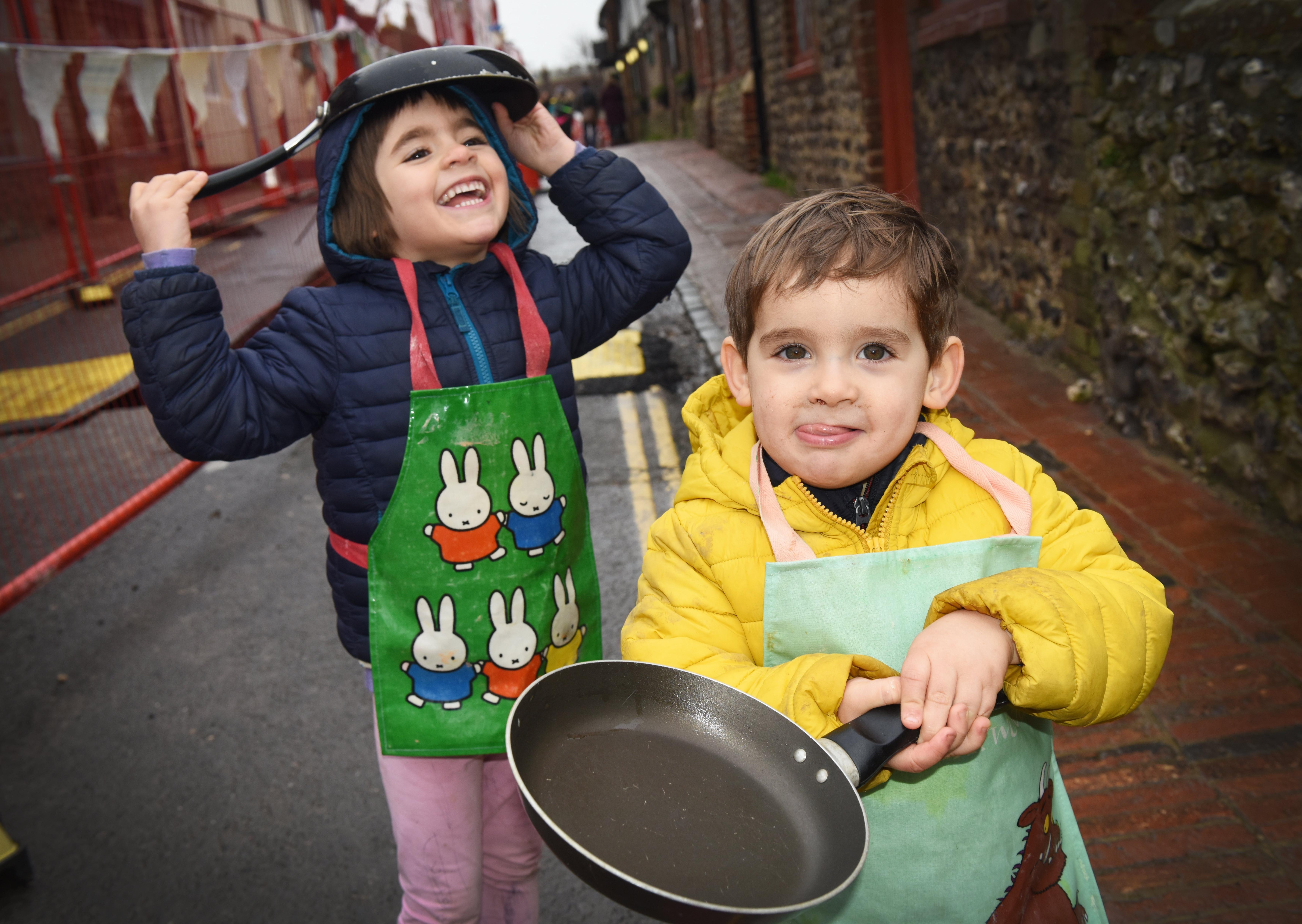 Parisa and Cyrus at the first Great Alfriston Pancake Race. Photograph: Justin Lycett/ SUS-200223-141904001