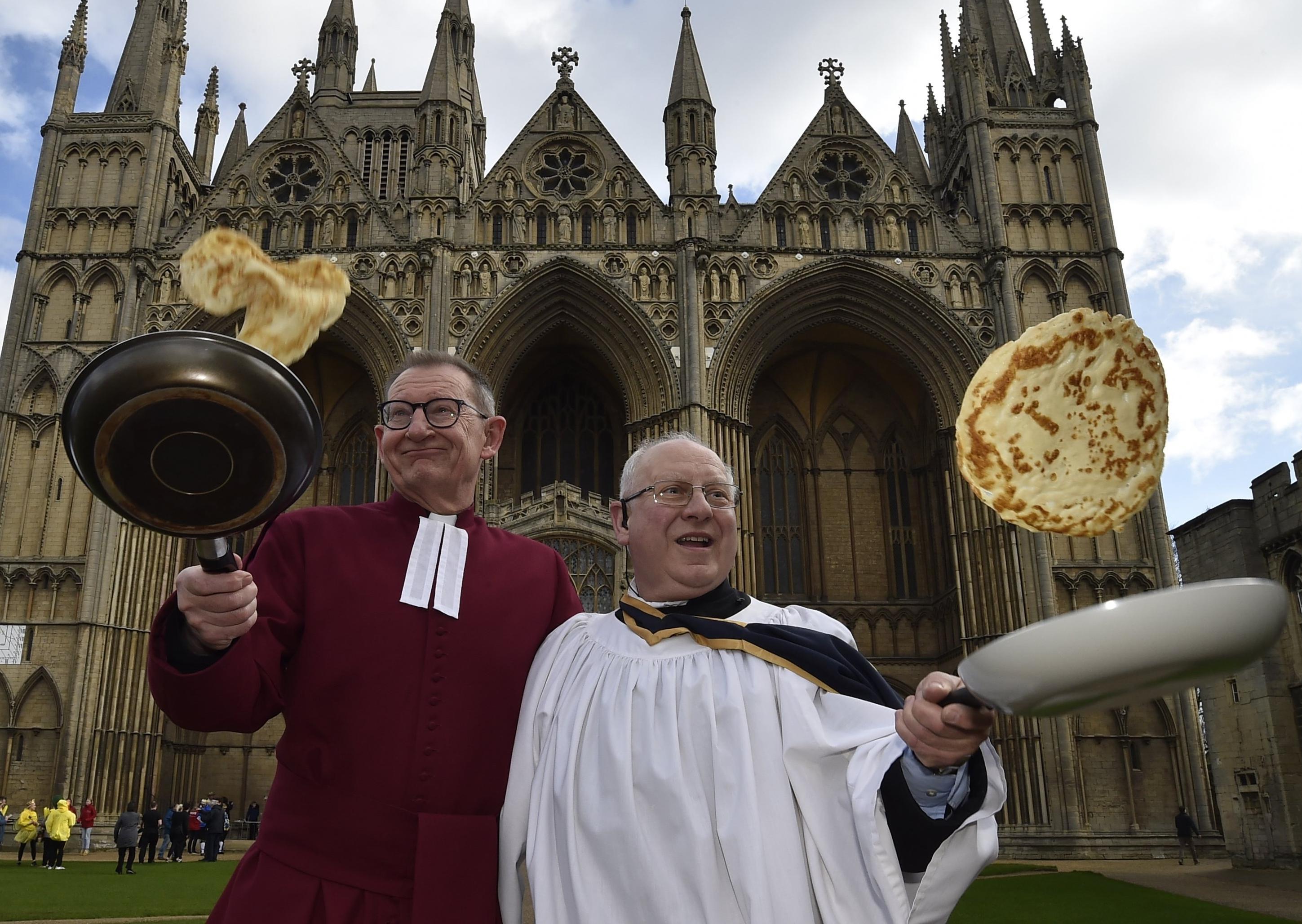 The Very Revd Christopher Dalliston, Dean of Peterborough, with head verger David Wood