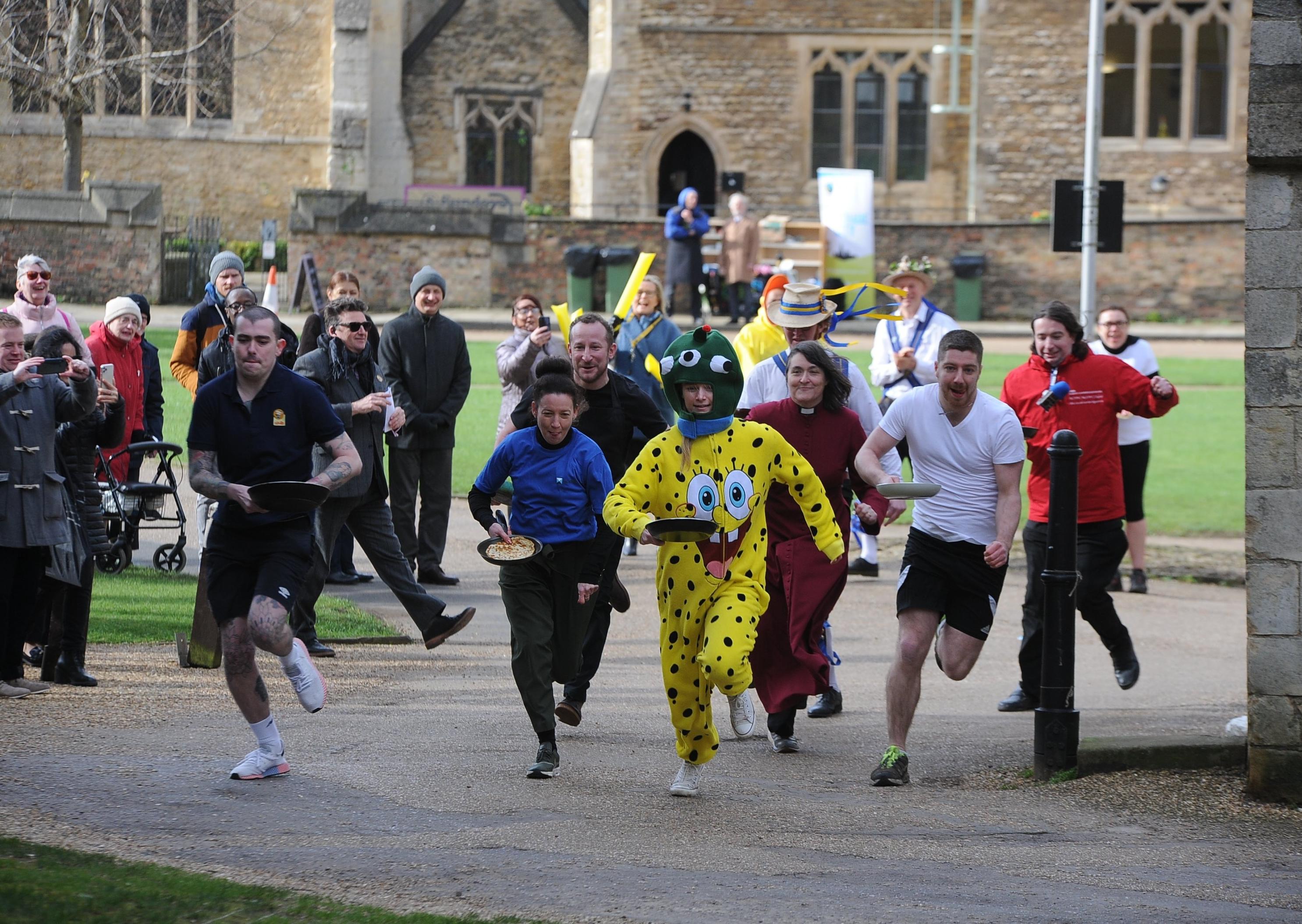 The pancake race at Peterborough Cathedral