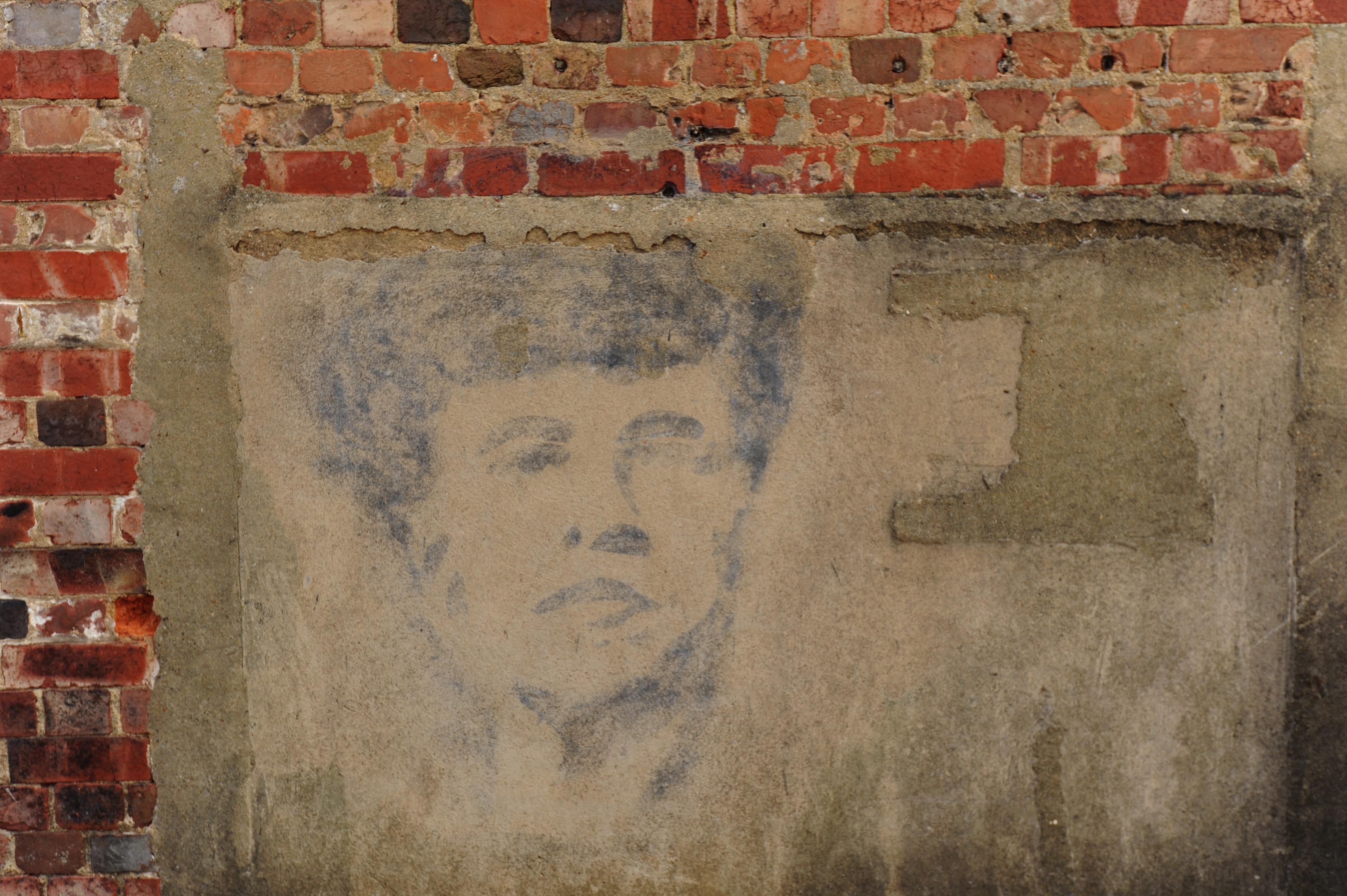 Not so obvious - A faded art piece on one of the run down buildings in the City

Picture by Louise Adams C130629-5 Ent Street Art ENGSUS00120130705105505