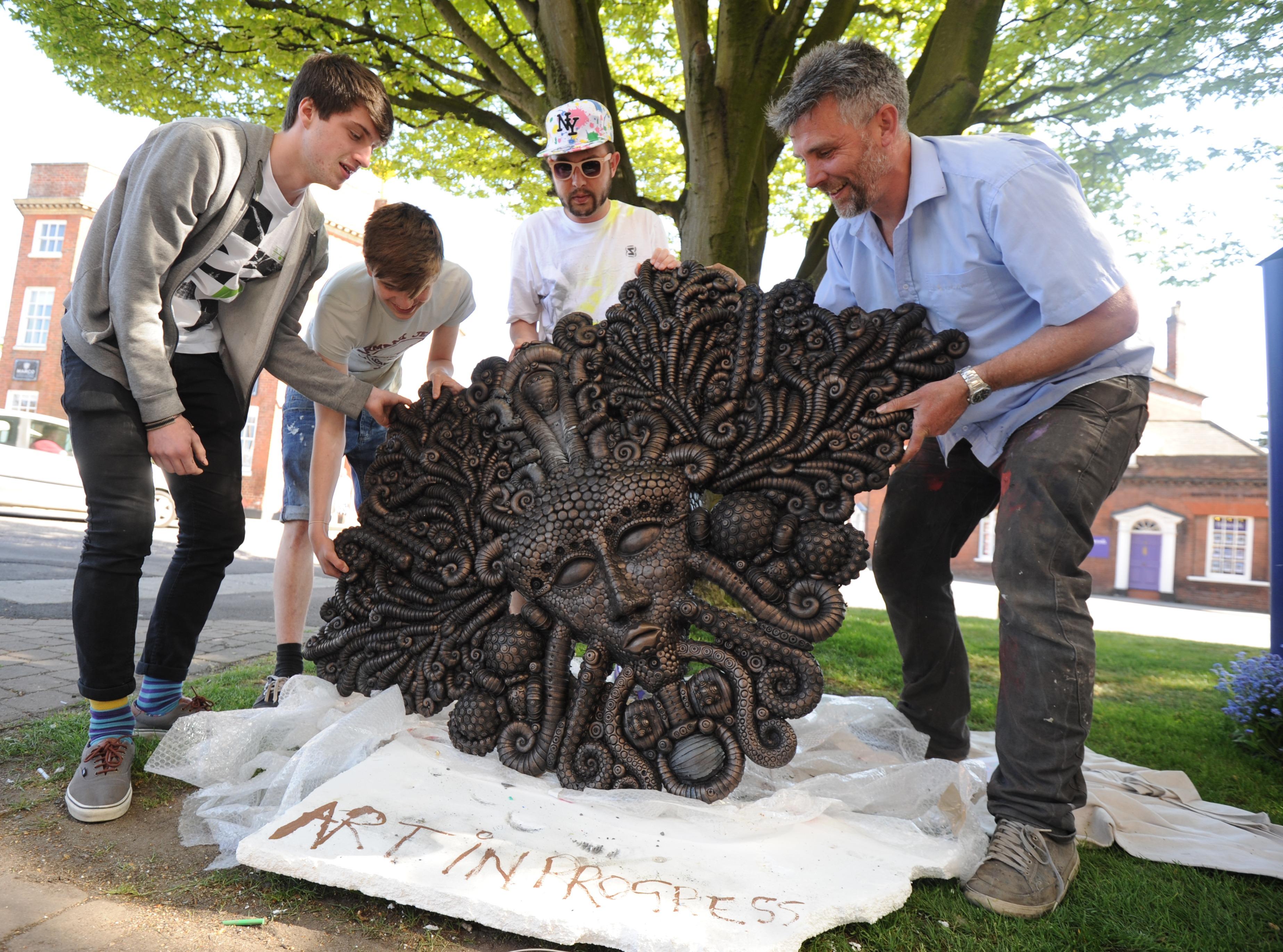 Cityzen Kane (right) ready to install his "HEX" sculpture in the City.

Picture by Louise Adams C130629-13 Ent Street Art ENGSUS00120130705105228