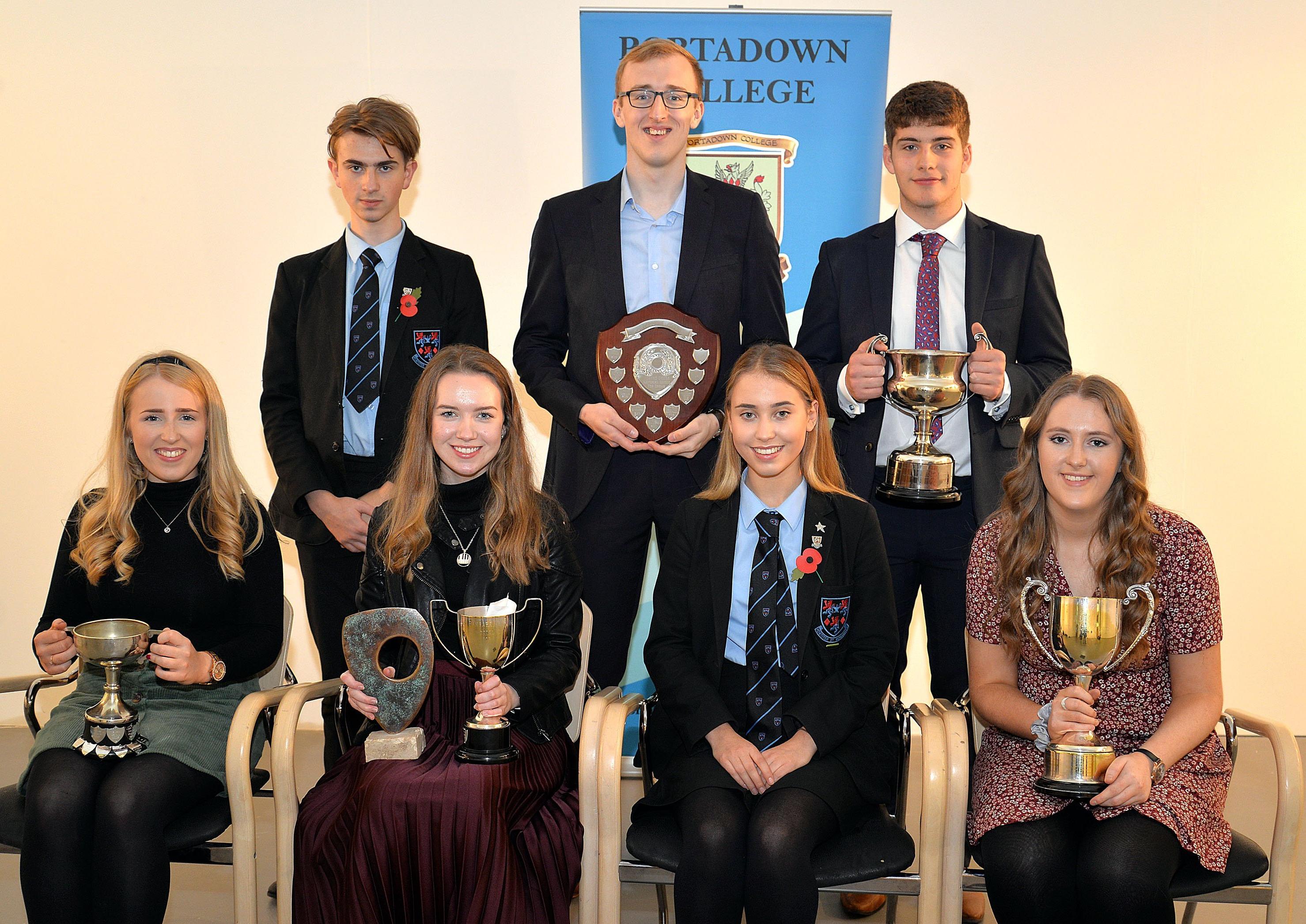 Arts and Community Award winners at Portadown College Speech Day including back row from left, Viggo Stanczak, Debating, Matthew Walsh, Drama, and Daniel Moorcroft, Community Services. Front from left, Amy Proctor, Music, Sara-Jo Loney, Music, Lily McClatchey, Drama, and Sophie McMahon, Community Services. INPT44-222.