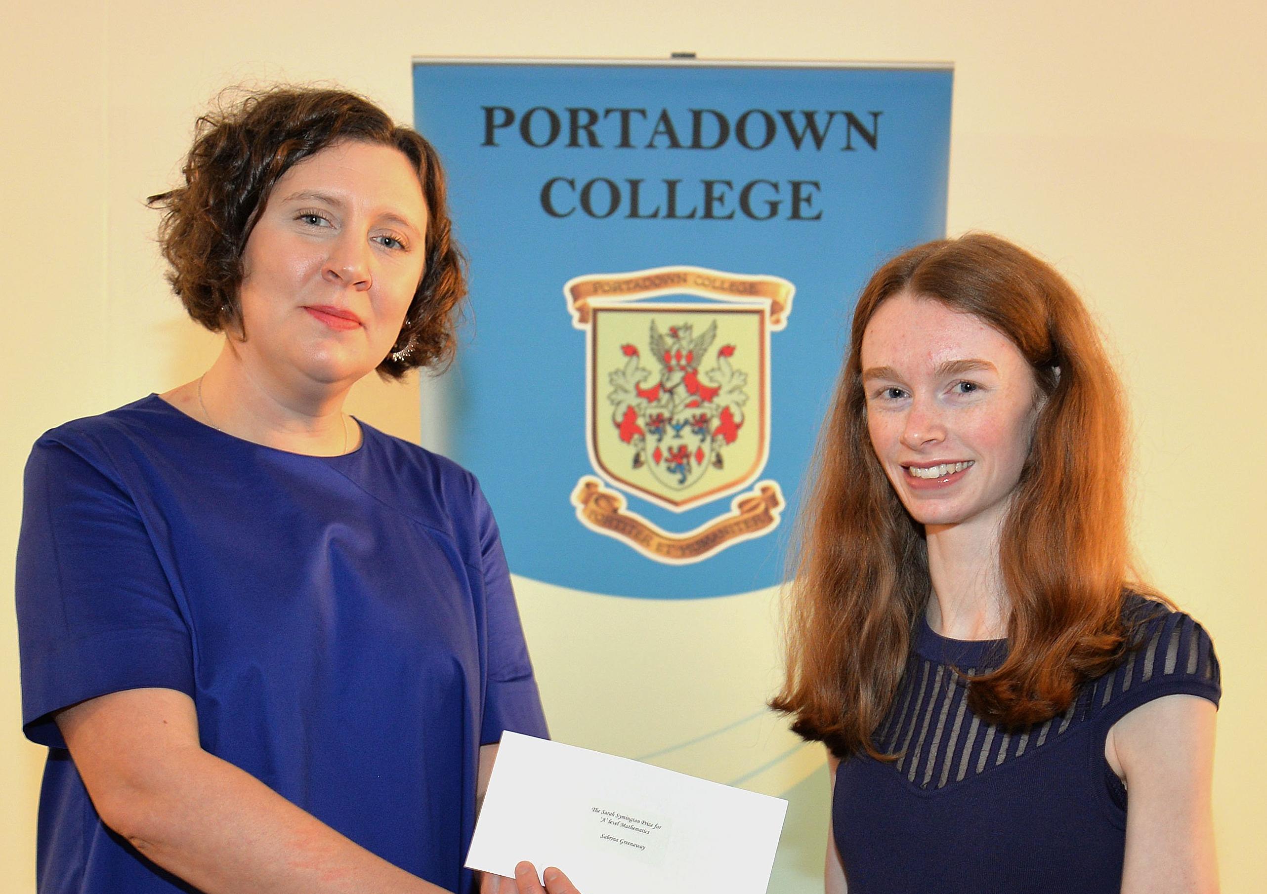 Sabrina Greenaway receives the prize for Excellent Achievement at 'A' Level from special guest, Shelley Brownlee at the school prize day. INPT44-217.