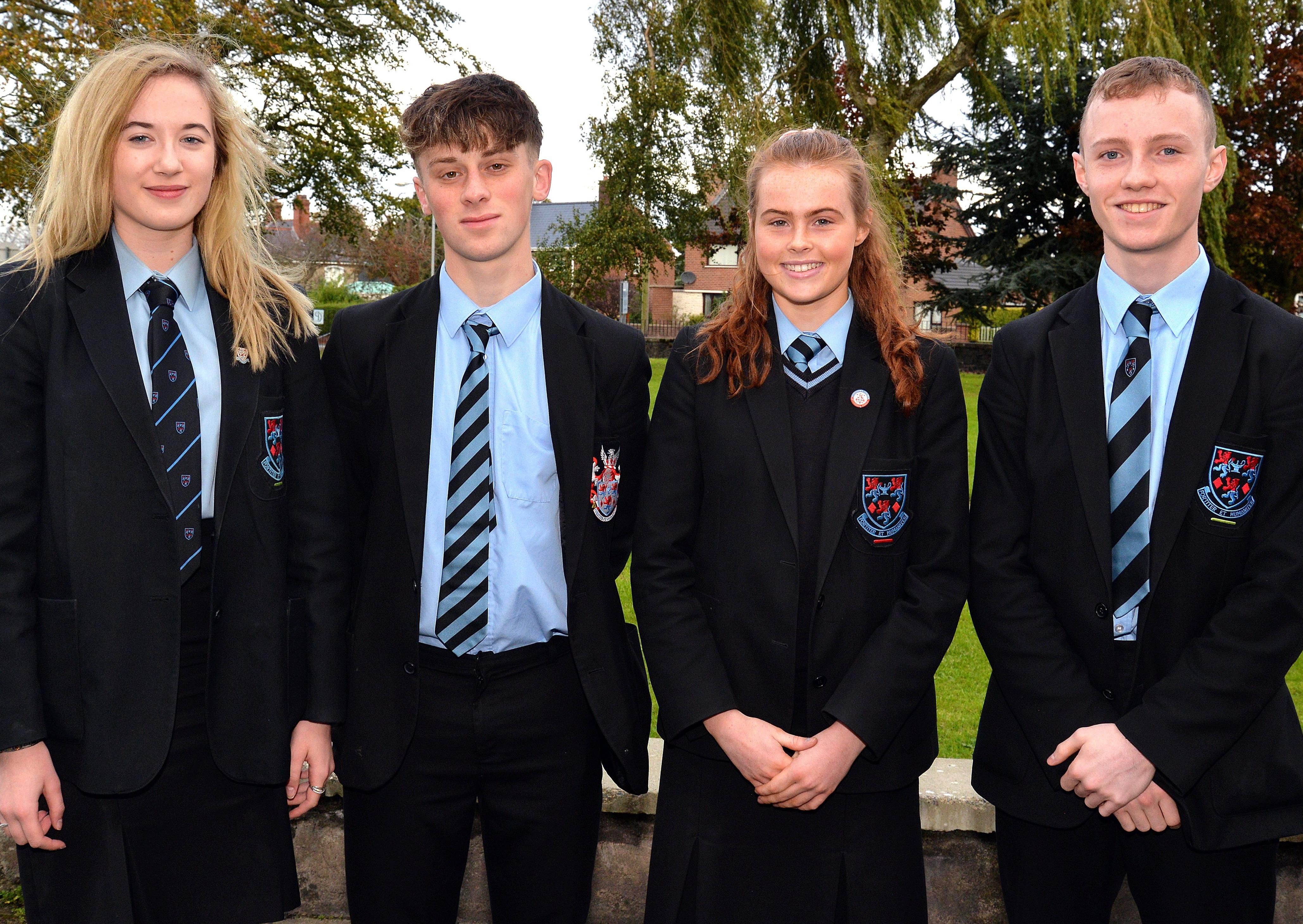 Portadown College pupils who were honoured for their sporting achievements at the school's annual Speech Day. Included from left are, Holly Teggart who represented Northern Irelandin Archery, Matthew Willis who competed in the 800m race at national level, Adam badger who competed in the Long Jump competition at National level, and Meadow McCauley who represented Ireland in Orienteering. INPT44-213.