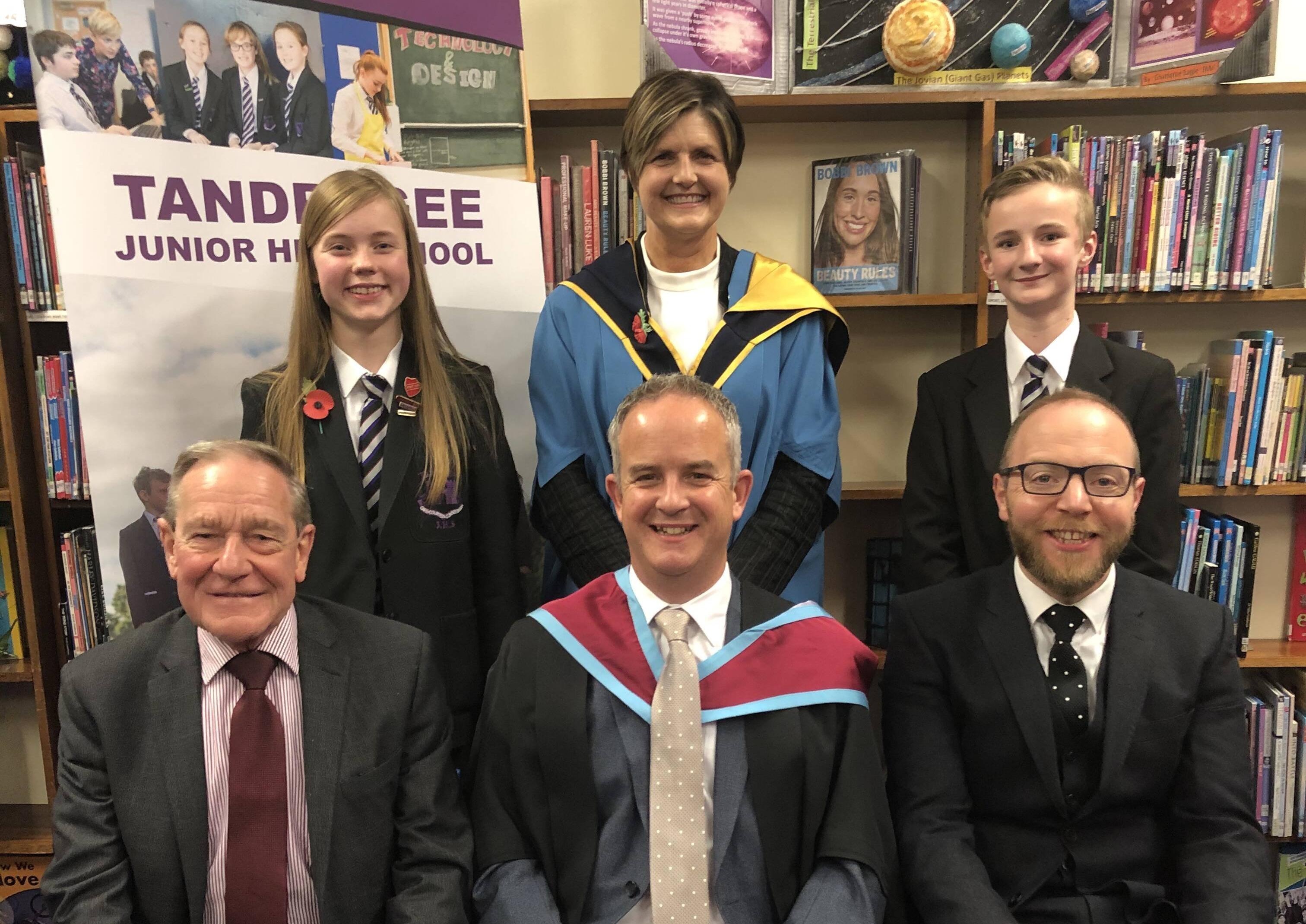 At the Tandragee Junior High School prize night are Head Girl (Rachel Spence) and Head Boy (Nathan Rafferty) pictured with Mrs DL Inns (Vice Principal), Mr R Leckey (Chairman of the Board of Governors), Mr W Brown (Principal) and Mr Mark Moorhead (Guest Speaker)
