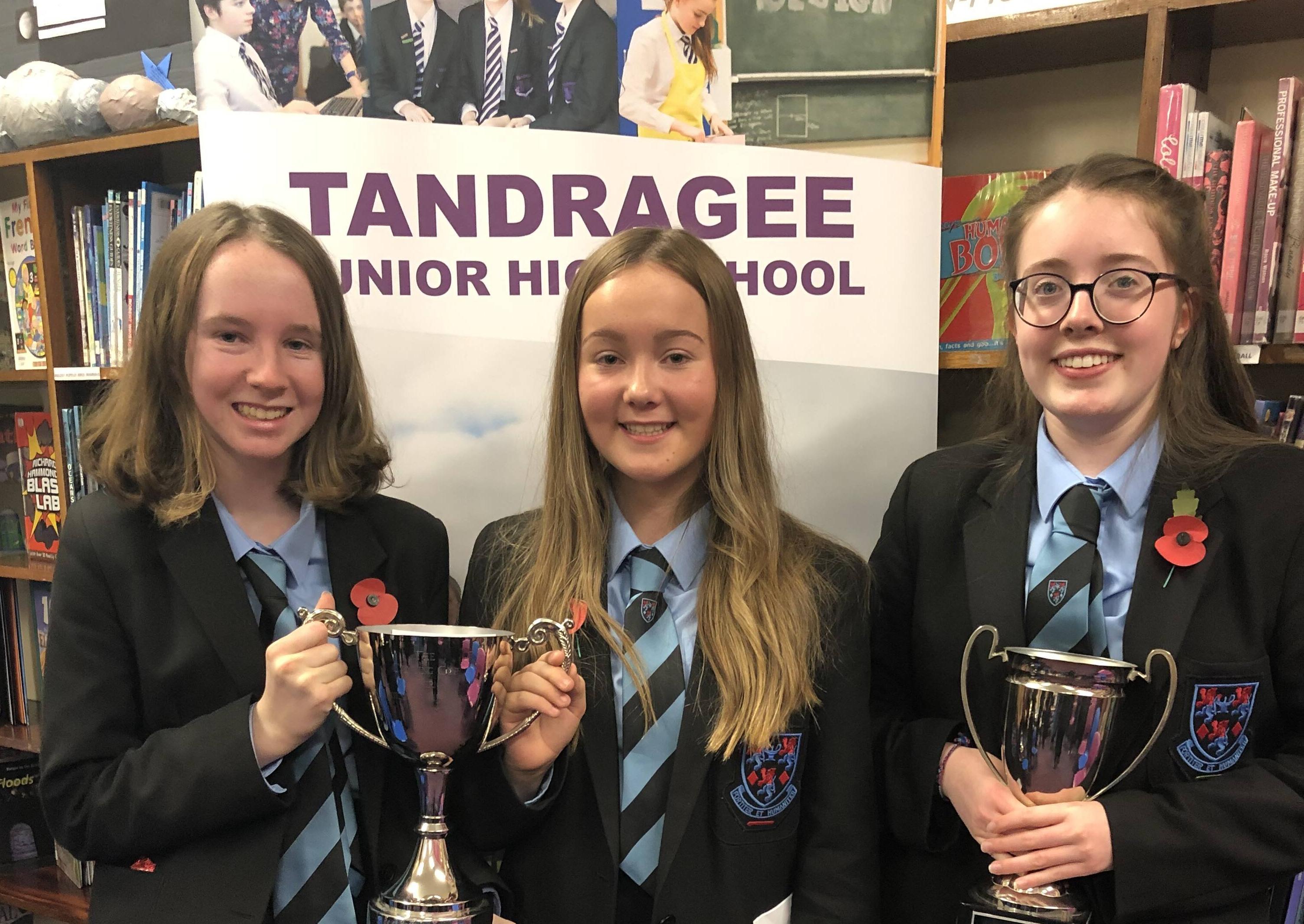 Kaitlin Rock and Ella Duke who shared the Canning Cup for Endeavor in Science pictured along with Jesse Best who won the Dr C Todd Cup for Sciences at the Tandragee Junior High School prize night
