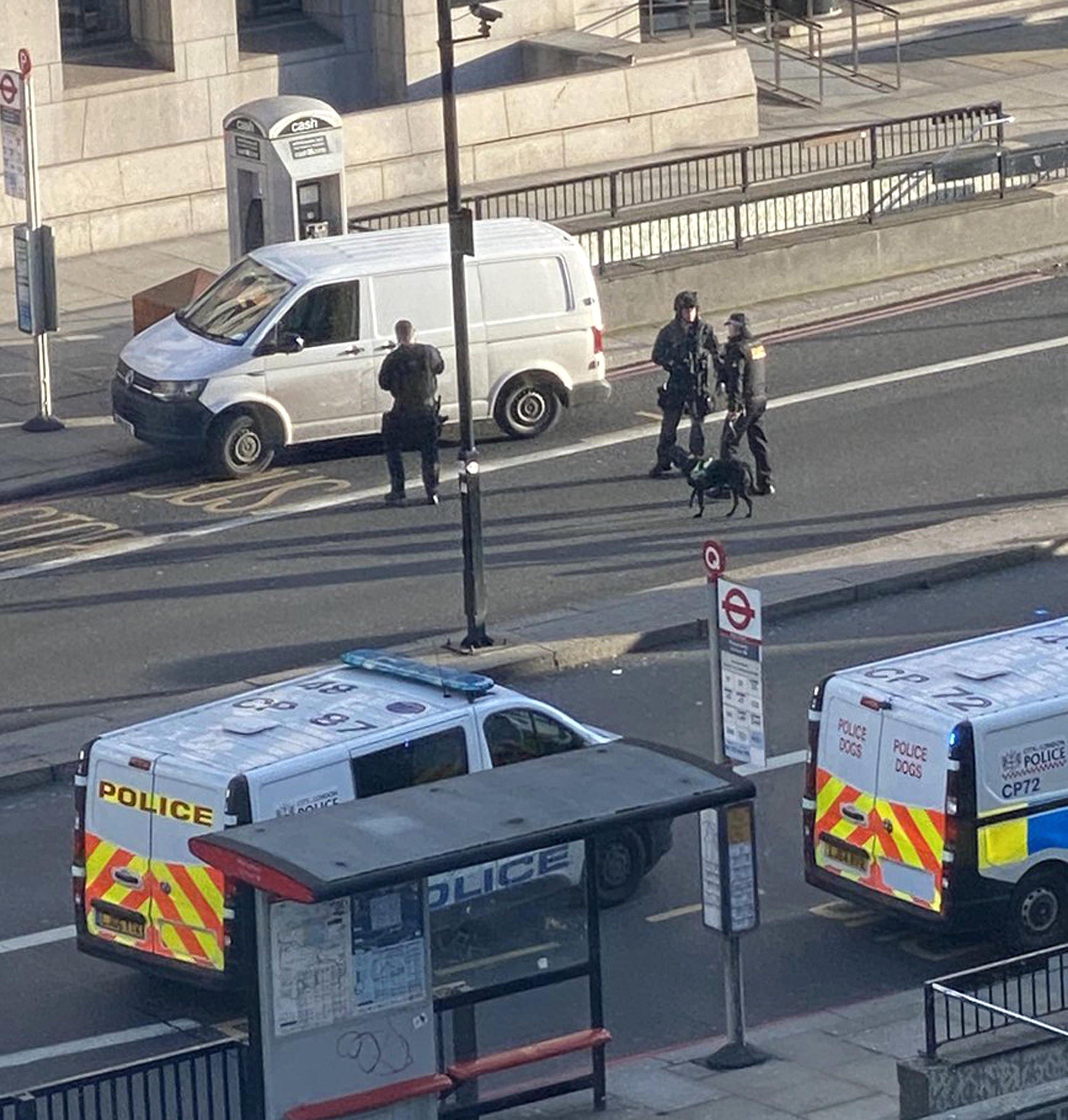 Handout photo taken with permission from the twitter feed of @ShashD of police at the scene of an incident on London Bridge in central London