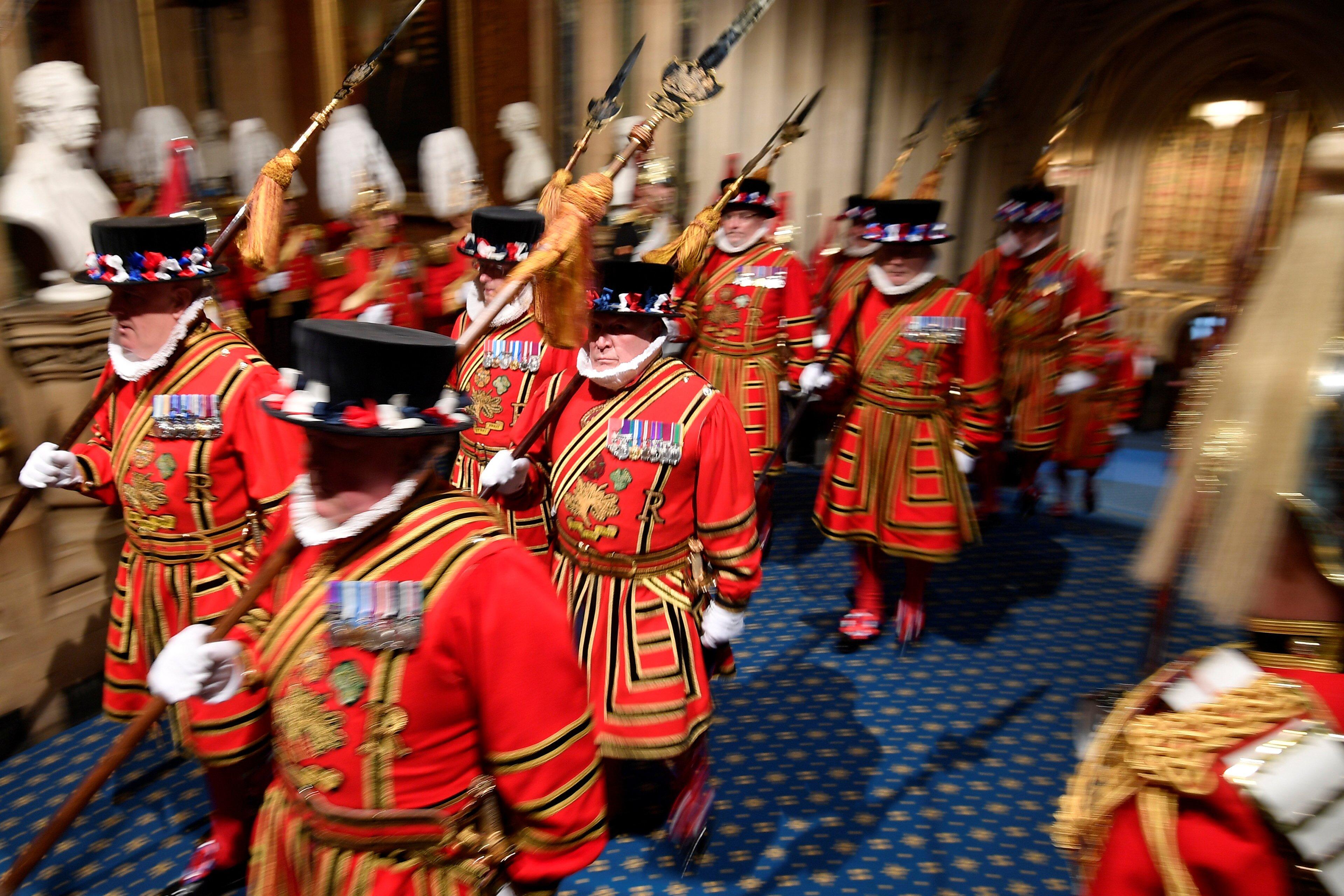 Yeoman warders parade through the Sovereign's entrance ahead of the State Opening of Parliament by Queen Elizabeth II, in the House of Lords at the Palace of Westminster in London.
