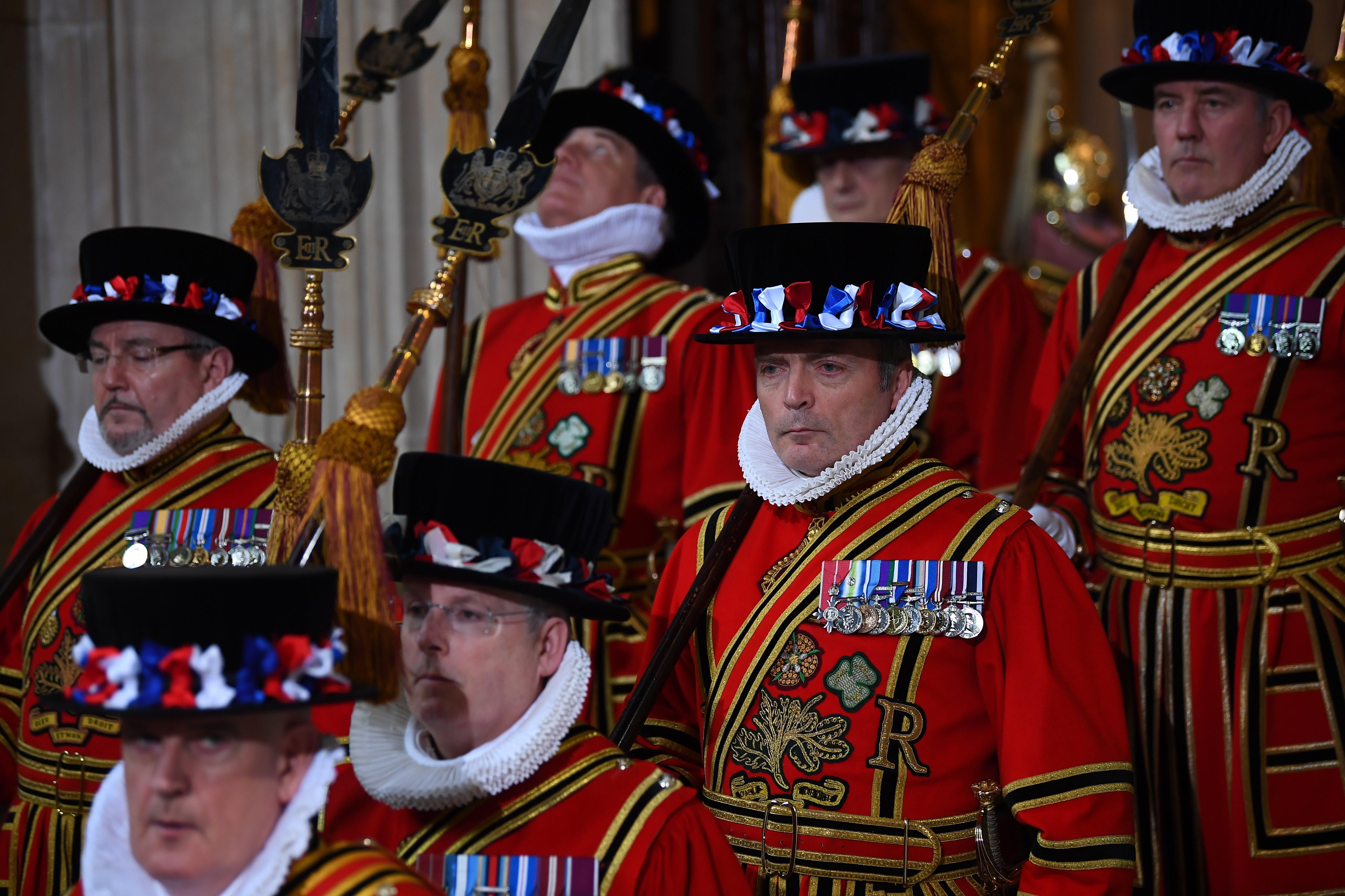 Yeoman Warders in the Sovereign's entrance ahead of the State Opening of Parliament by Queen Elizabeth II, in the House of Lords at the Palace of Westminster in London