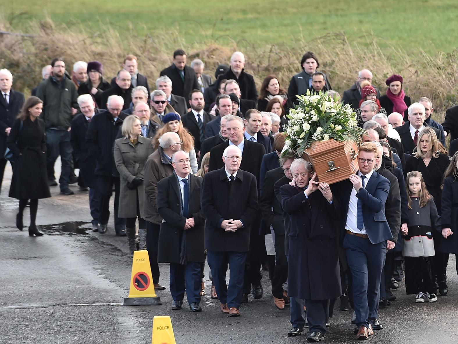 Mourners maker their way to the chapel.
