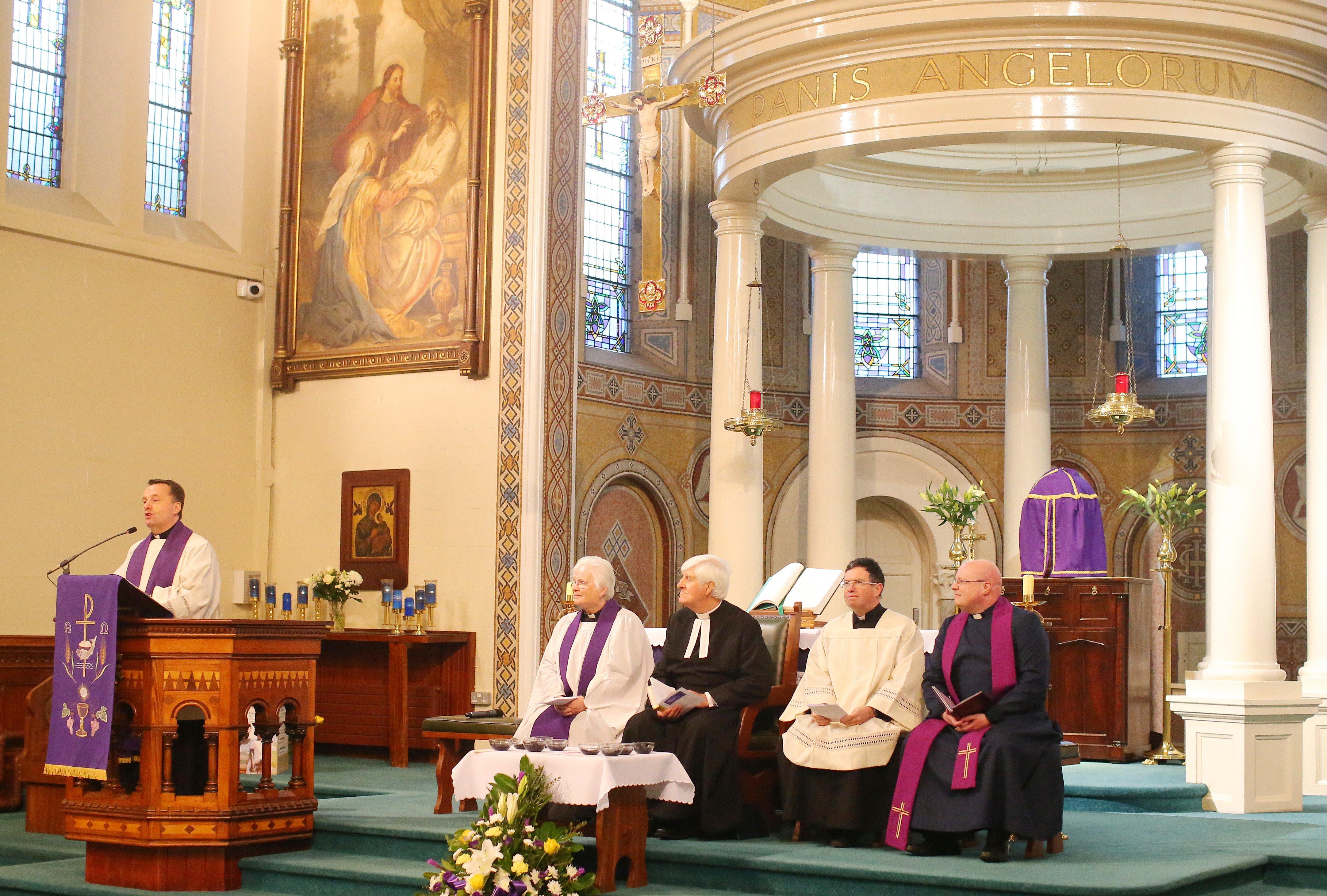 Fr Tim Bartlett, Rev Elizabeth Hanna, Rev Dr Ken Newell, Fr Martin Magill and Rev Robin Waugh pictured inside the church as the service begins